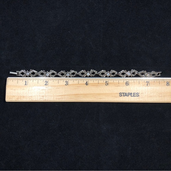 BRACELET - SILVER-TONE WITH 7 RHINESTONES EACH SET IN A SQUARE SETTING - Picture 14 of 16